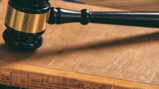 judge-gavel-on-law-books-wooden-desk-pxmwr9q-min_6814b52176641